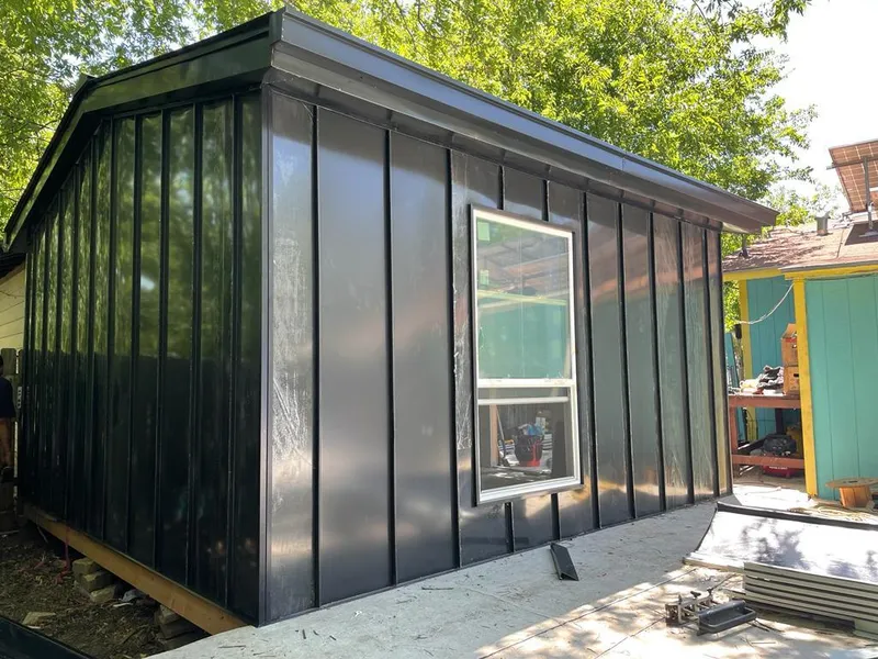 Black standing seam metal wall panels for Roof Inspection in Waldorf